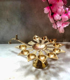 amishi blissful decor Dasmukhi Arti Diya,Aarti Standten Face Cutting Diya Deepak Brass Table Diya  (Height: 3 inch)