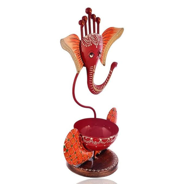 Divine Glow: Orange Iron Ganesh Tealight Holder - Auspicious Decor & Warm Candlelight
