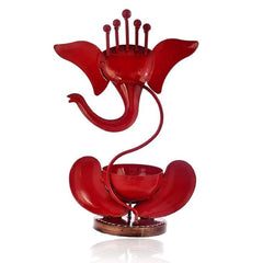 Divine Glow: Orange Iron Ganesh Tealight Holder - Auspicious Decor & Warm Candlelight