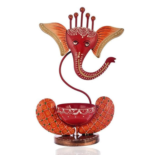 Divine Glow: Orange Iron Ganesh Tealight Holder - Auspicious Decor & Warm Candlelight