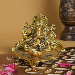 Great Art Ganesh Idol on Leaf - Lord Ganesha with Diya - Metal Hand Craved for Home Decorative Gift Puja Gifts Corporate